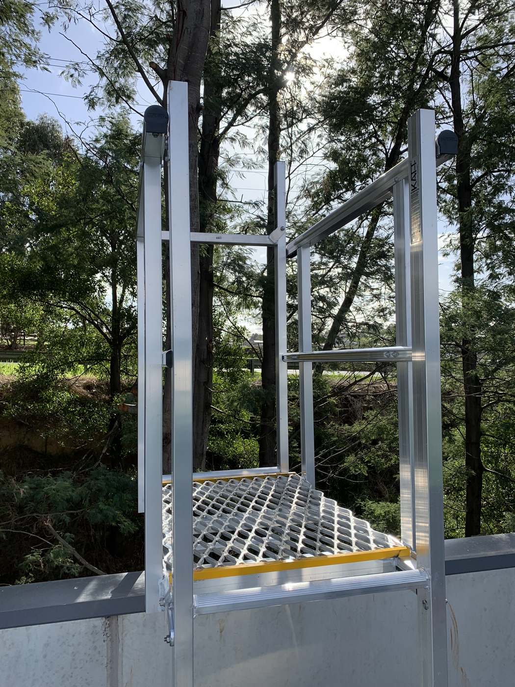 Fixed roof access ladder and platform height safety installation Melbourne