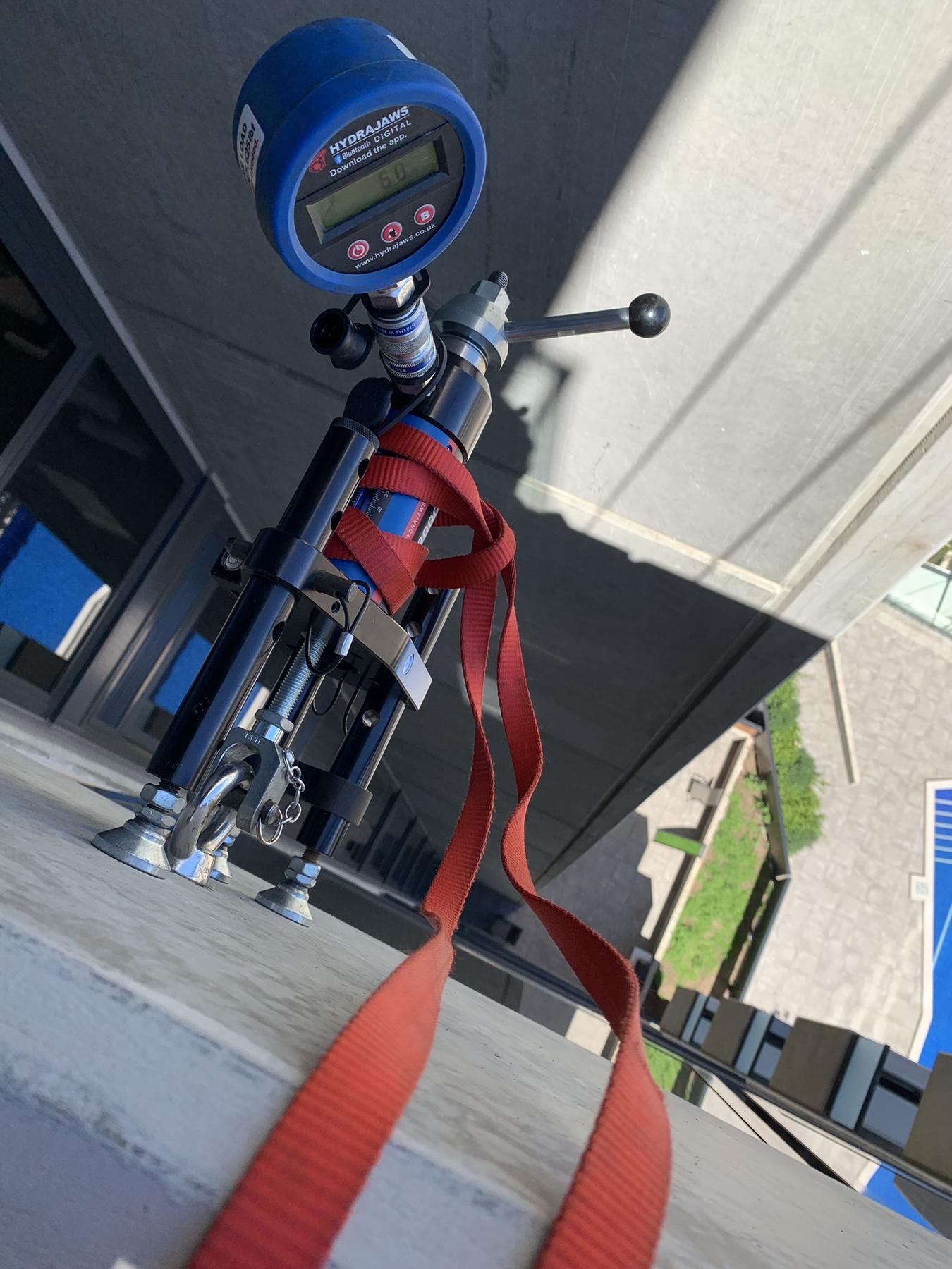 Anchor point load testing Melbourne with calibrated Hydrajaws tester by Hayes Height Services
