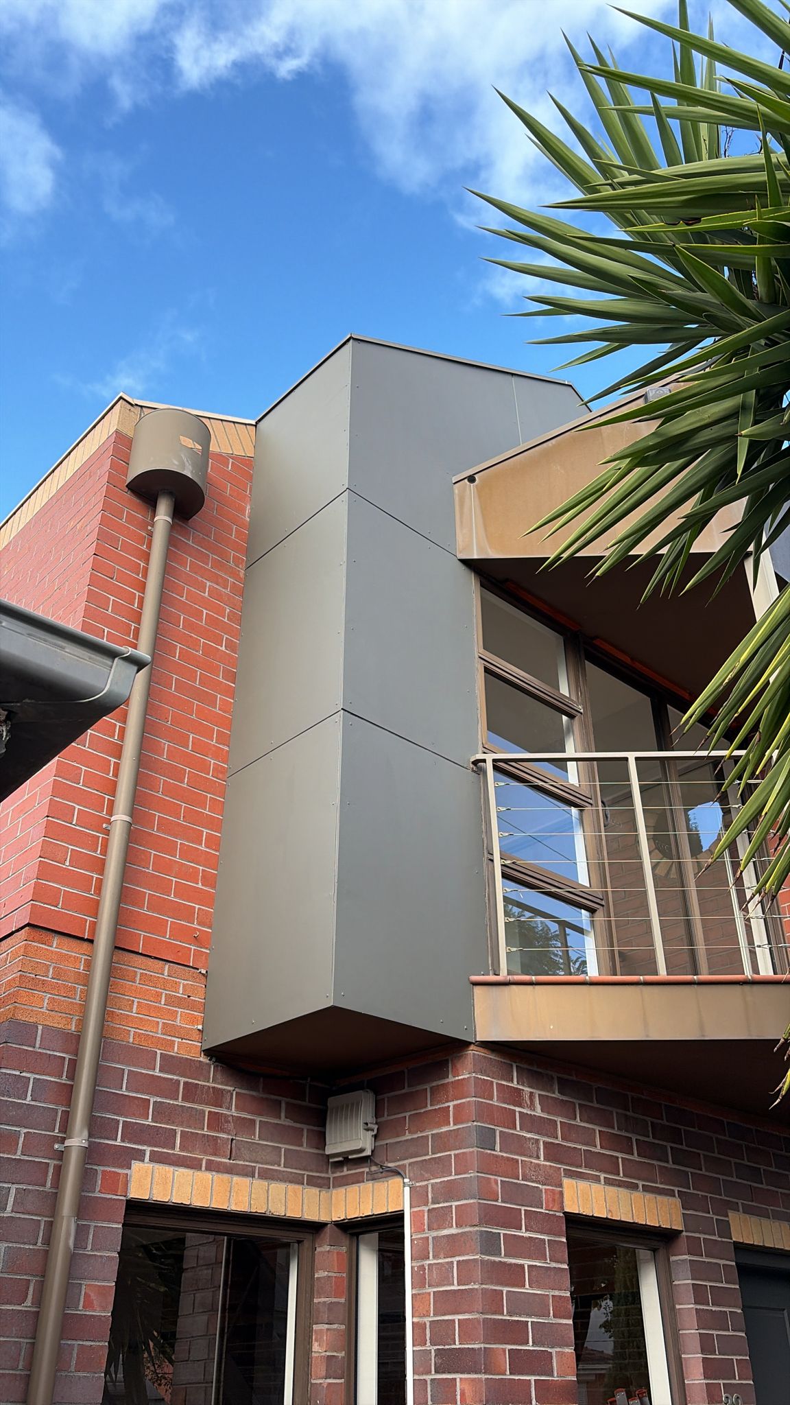 Building facade after rope access painting Melbourne — fresh clean finish by Hayes Height Services